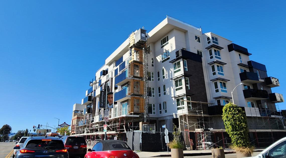 57 apartments + retail take shape at 6001 W Olympic