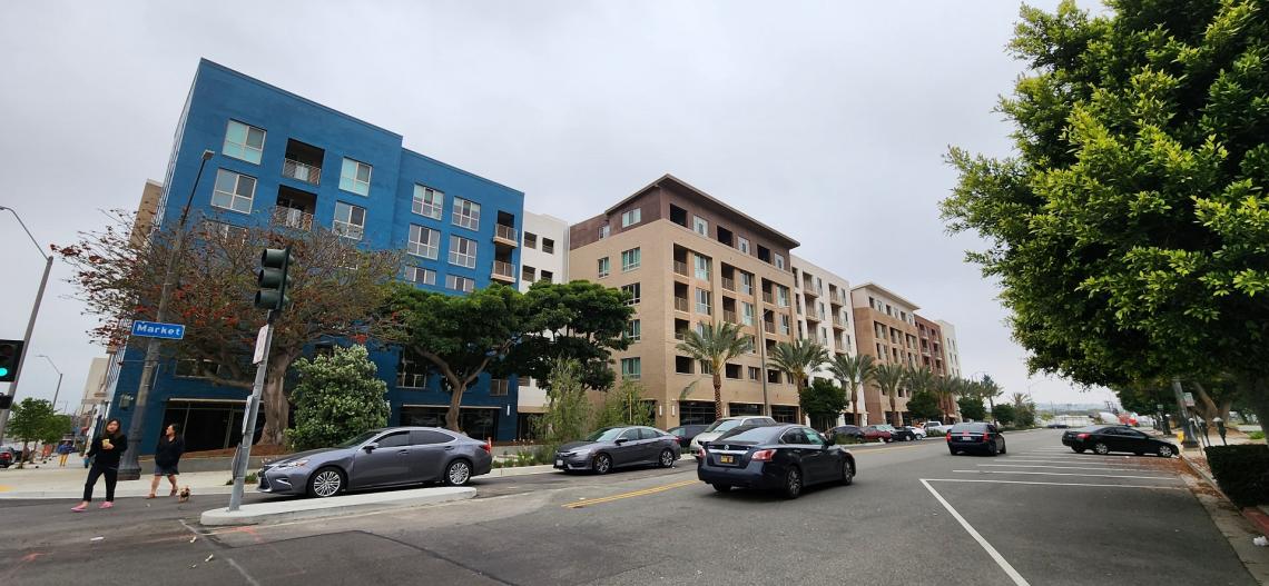 Rendering vs. Reality Astra apartments at 215 E Regent Street in