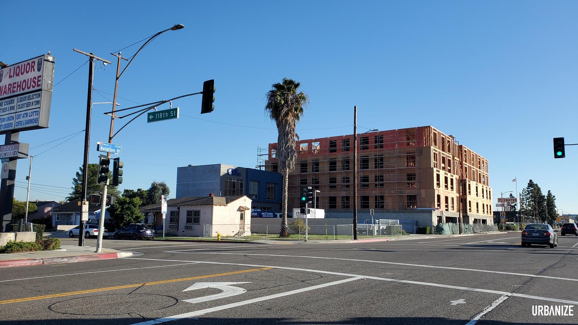 Six-story, 82-unit apartment building rises at 11814 Aviation